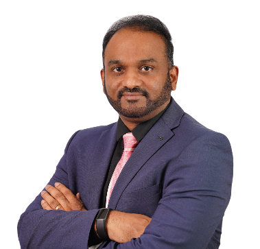 Karthikeyan Anbarasan in professional attire